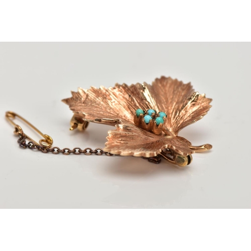 283 - A 9CT GOLD BROOCH, in the form of a textured leaf, to the centre are five small turquoise cabochons,... 