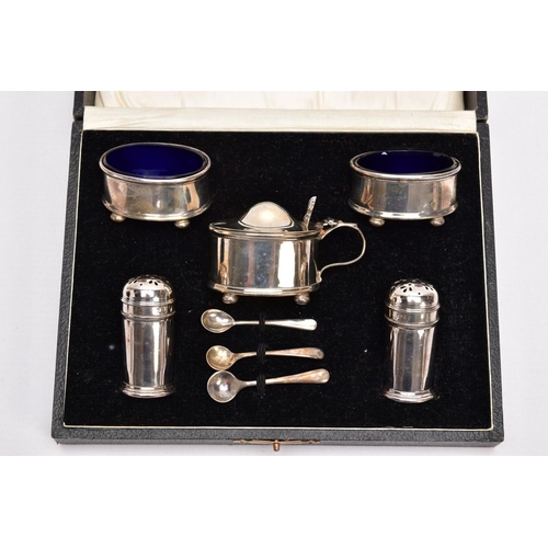 286 - A CASED SILVER FIVE PIECE CONDIMENT SET, comprising of two oval salts, each raised on four ball feet... 