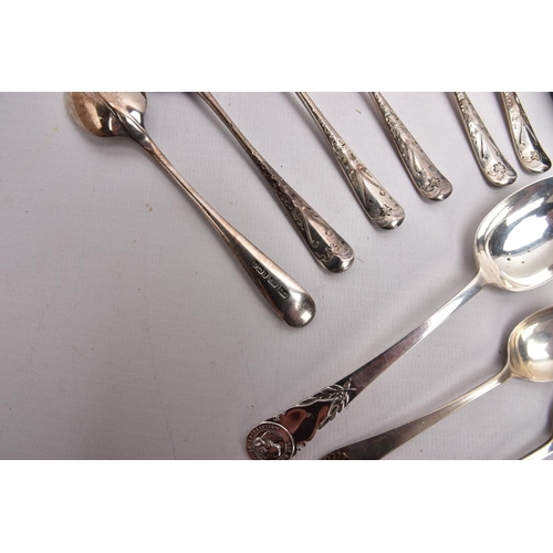 293 - A SELECTION OF SILVER TEASPOONS AND SUGAR TONGS, to include a cased set of six teaspoons, each decor... 