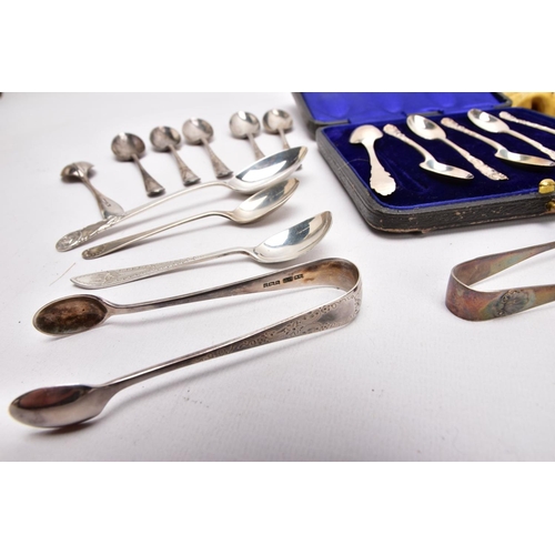 293 - A SELECTION OF SILVER TEASPOONS AND SUGAR TONGS, to include a cased set of six teaspoons, each decor... 