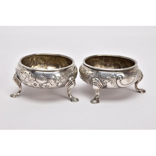 311 - A PAIR OF GEORGE II OPEN SILVER SALTS, cauldron shape, embossed floral design, vacant cartouche, rai... 