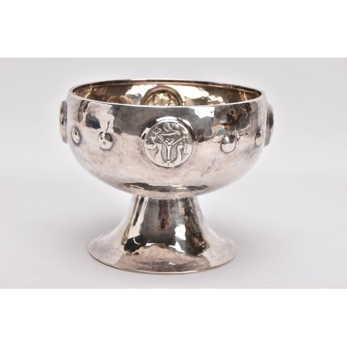 314 - AN ARTS & CRAFTS SILVER ROSE BOWL, hammer effect to the bowl, embossed floral and foliate emblems an... 