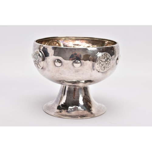 314 - AN ARTS & CRAFTS SILVER ROSE BOWL, hammer effect to the bowl, embossed floral and foliate emblems an... 