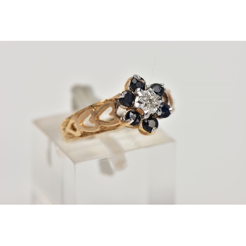 342 - A 9CT GOLD SAPPHIRE AND DIAMOND CLUSTER RING, the raised cluster of a flower shape, set with a centr... 