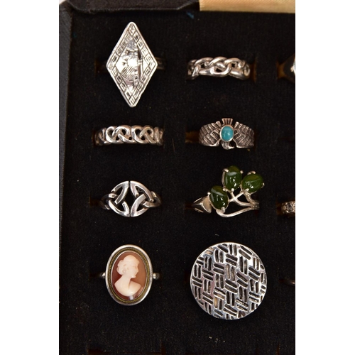 356 - A RING DISPLAY BOX WITH ASSORTED WHITE METAL RINGS, twenty rings of various designs such as Celtic b... 