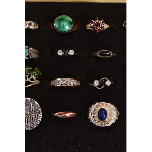 356 - A RING DISPLAY BOX WITH ASSORTED WHITE METAL RINGS, twenty rings of various designs such as Celtic b... 