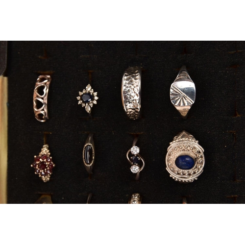 356 - A RING DISPLAY BOX WITH ASSORTED WHITE METAL RINGS, twenty rings of various designs such as Celtic b... 