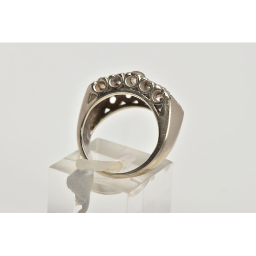 360 - A WHITE METAL DIAMOND RING, designed with two rows of claw set, graduated old and round brilliant cu... 