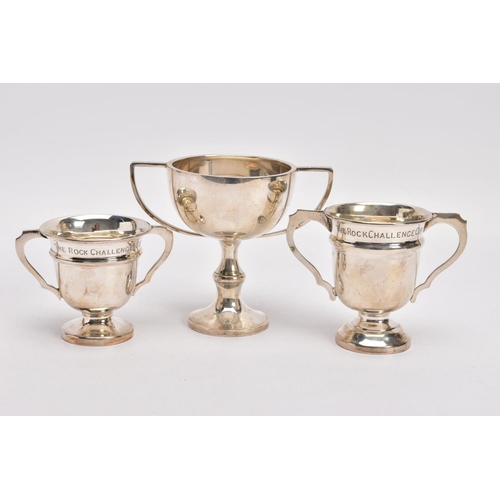 367 - THREE MINATURE SILVER TROPHY CUPS, two matching cups both engraved to the rim 'The rock challenge cu... 