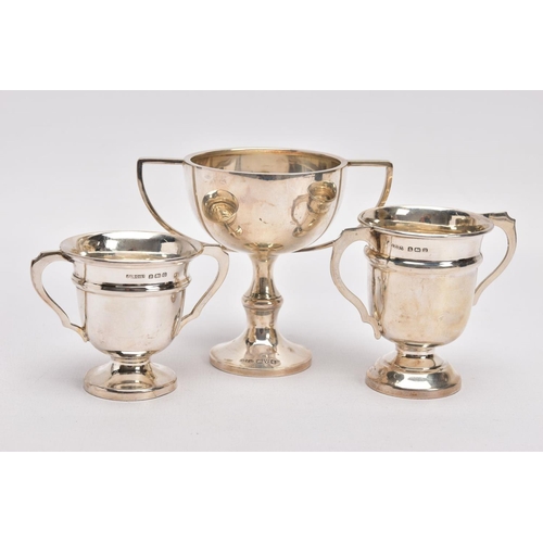 367 - THREE MINATURE SILVER TROPHY CUPS, two matching cups both engraved to the rim 'The rock challenge cu... 