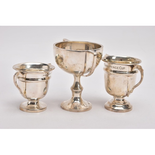 367 - THREE MINATURE SILVER TROPHY CUPS, two matching cups both engraved to the rim 'The rock challenge cu... 