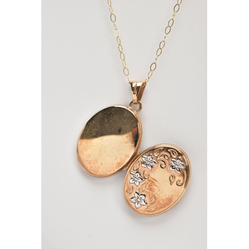 368 - A 9CT GOLD LOCKET PENDANT NECKLACE, the locket of an oval form, decorated with white metal flowers, ... 