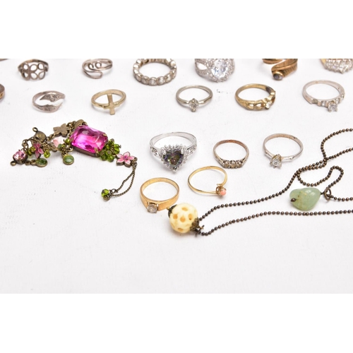 380 - A BAG OF MOSTLY COSTUME RINGS, yellow and white metal rings in various styles, some fitted with past... 