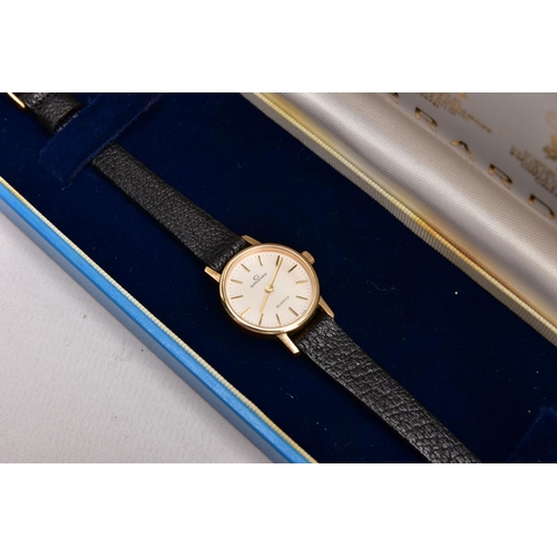 381 - A LADIES 9CT GOLD 'GARRARD' WRISTWATCH, quartz movement, round champagne dial signed 'Garrard', bato... 