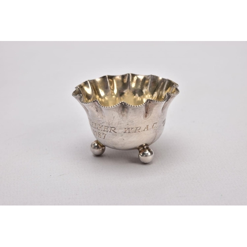 384 - A CASED SET OF FOUR SILVER SALTS WITH SALT SPOONS, each salt of a round shape, scallop rims, raised ... 