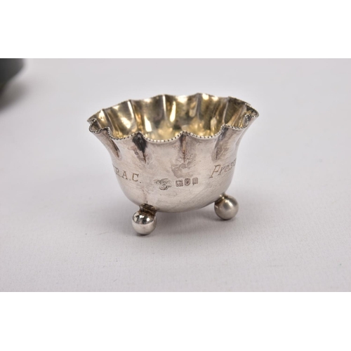 384 - A CASED SET OF FOUR SILVER SALTS WITH SALT SPOONS, each salt of a round shape, scallop rims, raised ... 