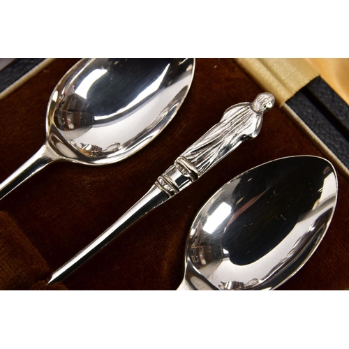 394 - A BOX OF MAINLY SILVER PLATED WARE, to include a pair of late Victorian silver sugar tongs, a late V... 