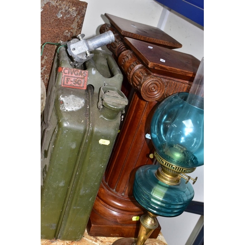 428 - SEVEN ITEMS, comprising a pair of wooden column pedestals, military marked petrol can, two oil lamps... 