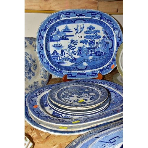 434 - FIFTEEN PIECES OF BLUE AND WHITE CERAMICS, mostly late Victorian, comprising eight meat plates, main... 