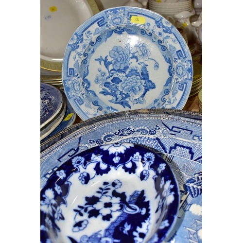 434 - FIFTEEN PIECES OF BLUE AND WHITE CERAMICS, mostly late Victorian, comprising eight meat plates, main... 