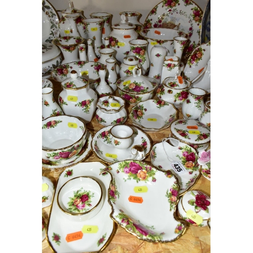 435 - APPROXIMATELY FIFTY PIECES OF ROYAL ALBERT OLD COUNTRY ROSES GIFTWARE, to include vases, (tallest 19... 