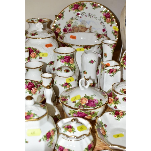 435 - APPROXIMATELY FIFTY PIECES OF ROYAL ALBERT OLD COUNTRY ROSES GIFTWARE, to include vases, (tallest 19... 