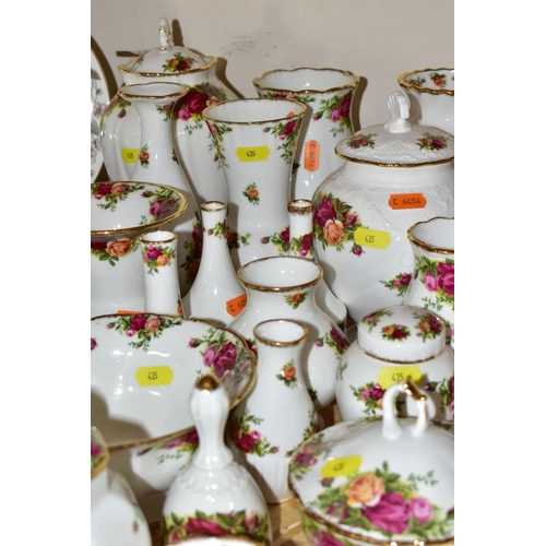 435 - APPROXIMATELY FIFTY PIECES OF ROYAL ALBERT OLD COUNTRY ROSES GIFTWARE, to include vases, (tallest 19... 