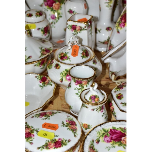 435 - APPROXIMATELY FIFTY PIECES OF ROYAL ALBERT OLD COUNTRY ROSES GIFTWARE, to include vases, (tallest 19... 