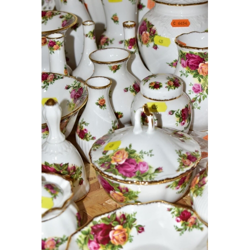 435 - APPROXIMATELY FIFTY PIECES OF ROYAL ALBERT OLD COUNTRY ROSES GIFTWARE, to include vases, (tallest 19... 