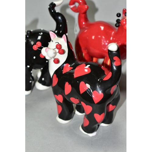 464 - THREE LACOMBE WILLITTS DESIGNS 'WHIMSICLAY' CERAMIC CATS, comprising a black and white polka dot cat... 