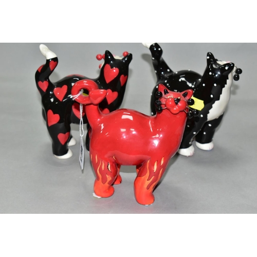 464 - THREE LACOMBE WILLITTS DESIGNS 'WHIMSICLAY' CERAMIC CATS, comprising a black and white polka dot cat... 