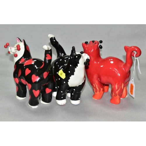 464 - THREE LACOMBE WILLITTS DESIGNS 'WHIMSICLAY' CERAMIC CATS, comprising a black and white polka dot cat... 