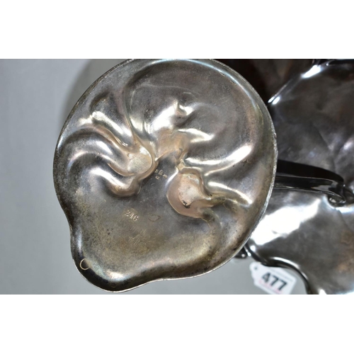 477 - A SILVER PLATED WMF ART NOUVEAU COMPORT, in the form of a fairy holding a bird with two lily pads at... 