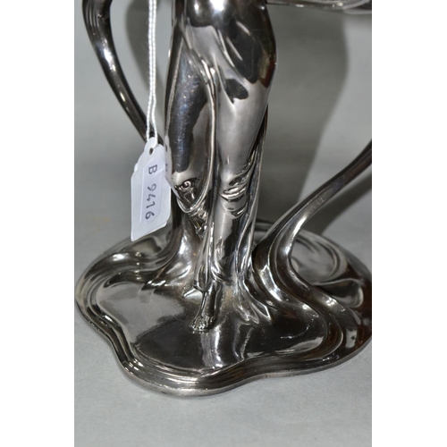 477 - A SILVER PLATED WMF ART NOUVEAU COMPORT, in the form of a fairy holding a bird with two lily pads at... 