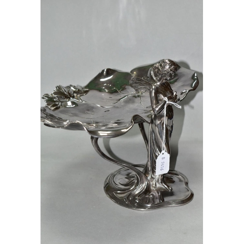 477 - A SILVER PLATED WMF ART NOUVEAU COMPORT, in the form of a fairy holding a bird with two lily pads at... 