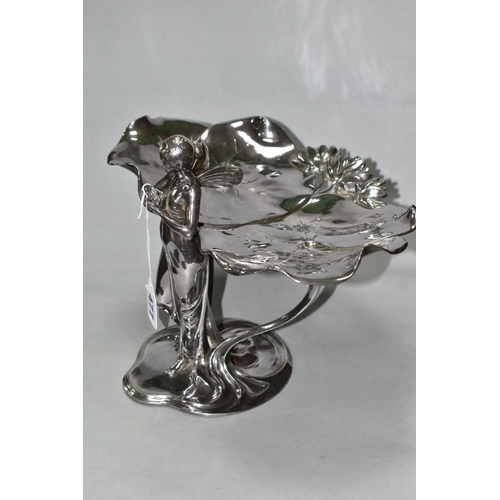 477 - A SILVER PLATED WMF ART NOUVEAU COMPORT, in the form of a fairy holding a bird with two lily pads at... 