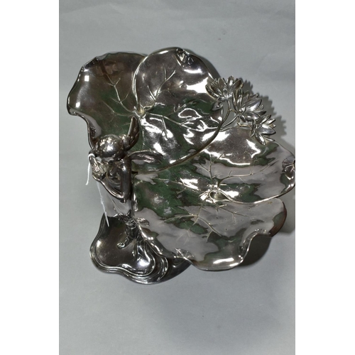 477 - A SILVER PLATED WMF ART NOUVEAU COMPORT, in the form of a fairy holding a bird with two lily pads at... 