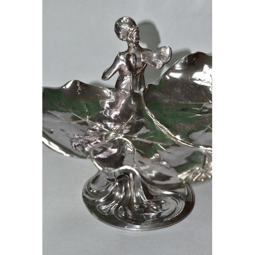 477 - A SILVER PLATED WMF ART NOUVEAU COMPORT, in the form of a fairy holding a bird with two lily pads at... 