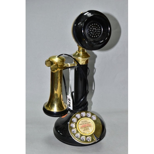 479 - A MODERN REPROUCTION CANDLESTICK TELEPHONE, of steel body with brass and bakelite fittings, appears ... 