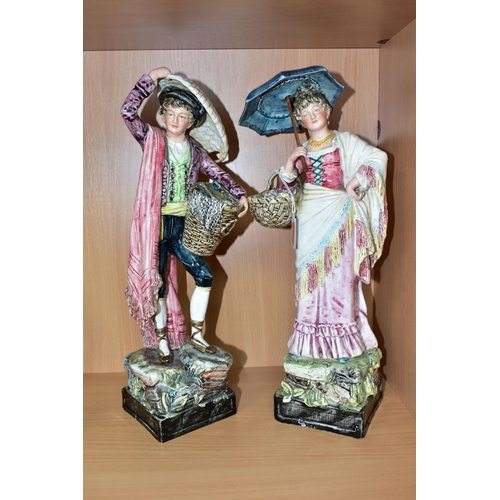 480 - A PAIR OF ROYAL DUX FIGURINES OF CONTINENTAL STREET VENDORS, the gentleman with a basket of fish, hi... 