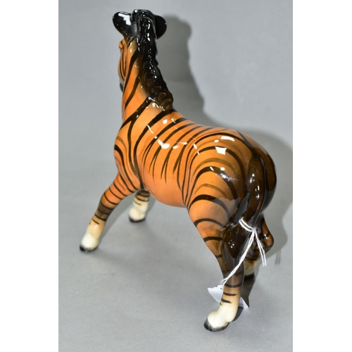 483 - A BESWICK ZEBRA, first version in tan colourway with black stripes, Model No 845A height 18.4cm (Con... 