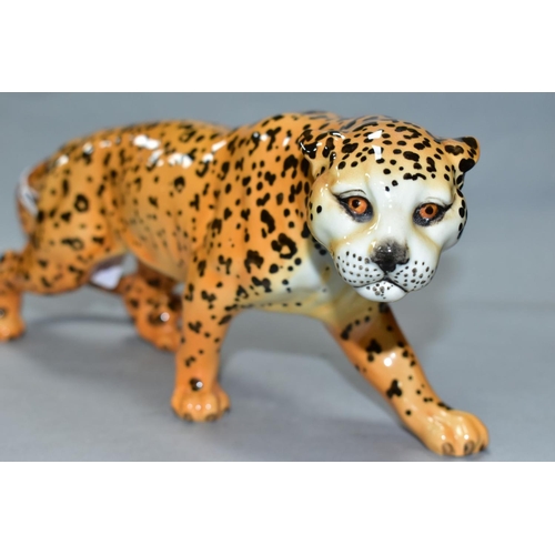 498 - A BESWICK LEOPARD, model 1082, approximate length 30cm, height 12cm (Condition Report:- good)