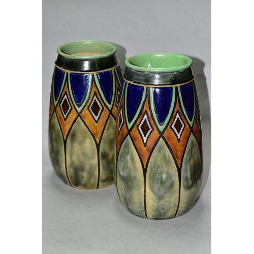 502 - A PAIR OF EARLY 20TH CENTURY ROYAL DOULTON STONEWARE BALUSTER VASES, incised and glazed with geometr... 