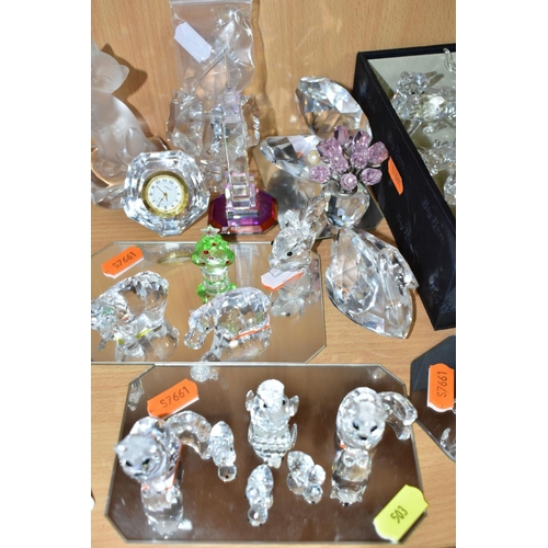 503 - TWENTY THREE SWAROVSKI AND OTHER CRYSTAL FIGURES, to include cat and three kittens set with ball, du... 