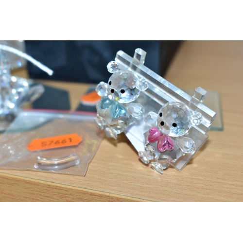 503 - TWENTY THREE SWAROVSKI AND OTHER CRYSTAL FIGURES, to include cat and three kittens set with ball, du... 