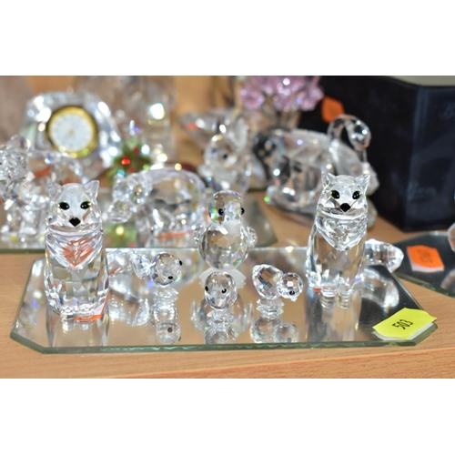 503 - TWENTY THREE SWAROVSKI AND OTHER CRYSTAL FIGURES, to include cat and three kittens set with ball, du... 