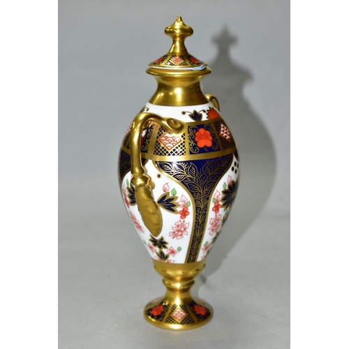 505 - A ROYAL CROWN DERBY TWIN HANDLED LIDDED URN, with painted and printed red marks, marked 128 and MMI ... 