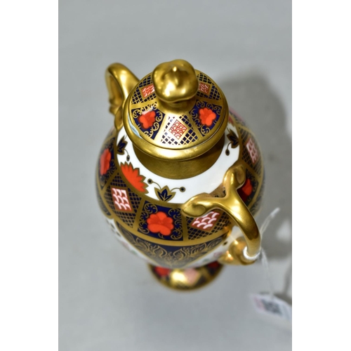 505 - A ROYAL CROWN DERBY TWIN HANDLED LIDDED URN, with painted and printed red marks, marked 128 and MMI ... 