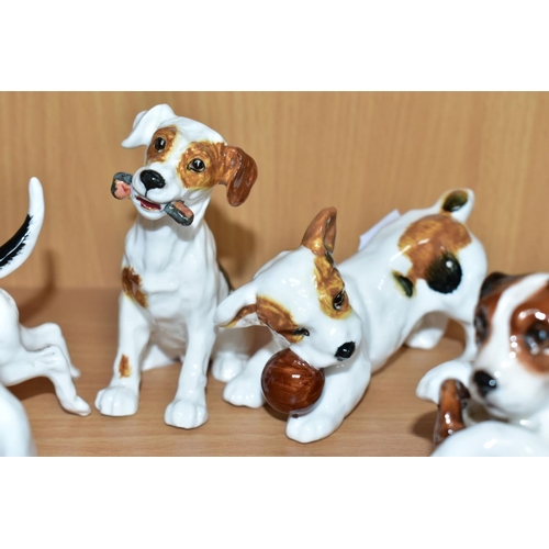 506 - TWELVE ROYAL DOULTON CHARACTER DOGS, comprising HN2586, HN2587 (extensive cracks), HN2554, HN2590, H... 