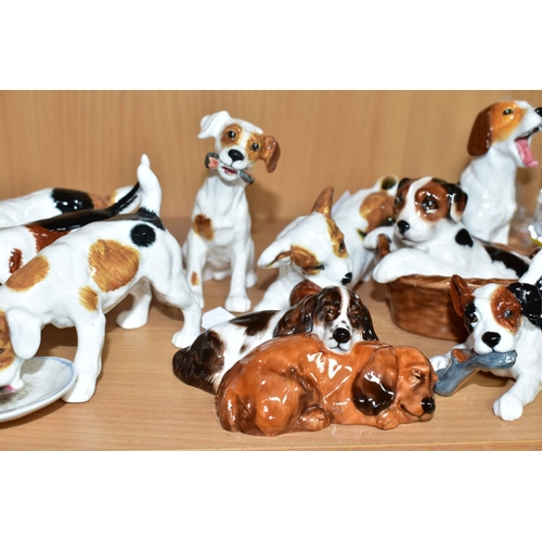 506 - TWELVE ROYAL DOULTON CHARACTER DOGS, comprising HN2586, HN2587 (extensive cracks), HN2554, HN2590, H... 